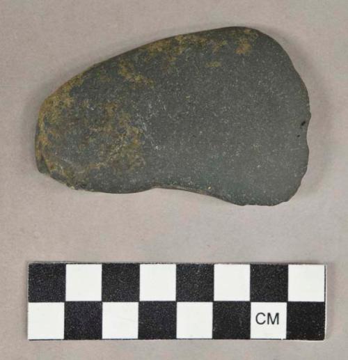 Ground stone, edged tool, chipped at one edge