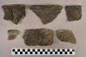 Ceramic, earthenware rim and body sherds, shell tempered, incised and punctate, one with strap handle