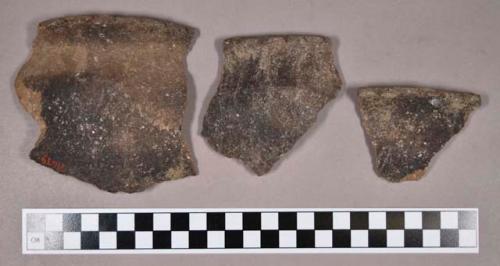 Ceramic, earthenware rim sherds, shell-tempered, notched rims, undecorated and cord-impressed bodies