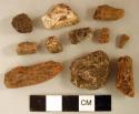 Coarse earthenware sherds, including white slipped body sherds and possible figurine sherds