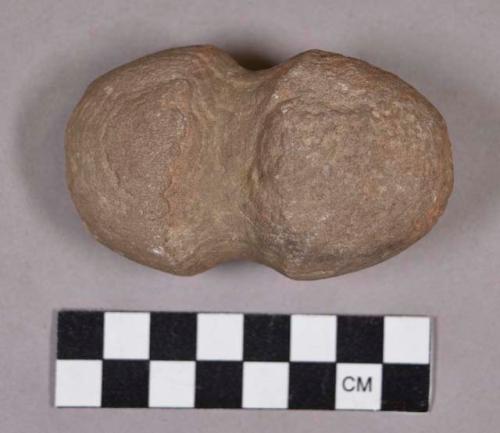 Ground stone, modified lithic, grooved stone, possible maul