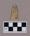 Chipped stone, projectile point, triangular, slightly eared base