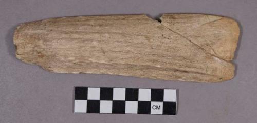 Organic, utilized antler, rectangular shaped object with sharpened edge; mended