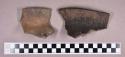 Ceramic, earthenware rim sherds, cord-impressed, residue on interior