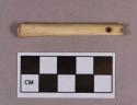 Organic, utilized bone fragment, perforated tube, possible flute or whistle fragment