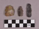 Chipped stone, triangular projectile point, scraper, and perforator