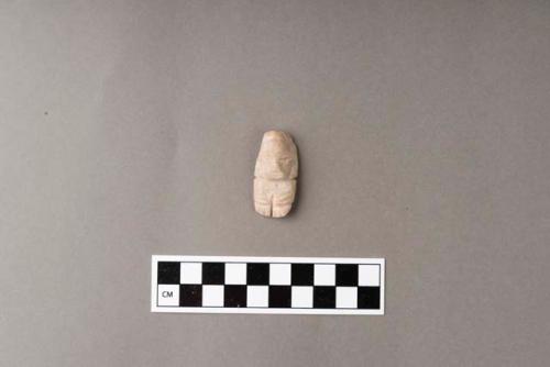 Ground stone; ornament; pendant; incised, both sides