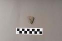 Ground stone; ornament; pendant; incised, both sides