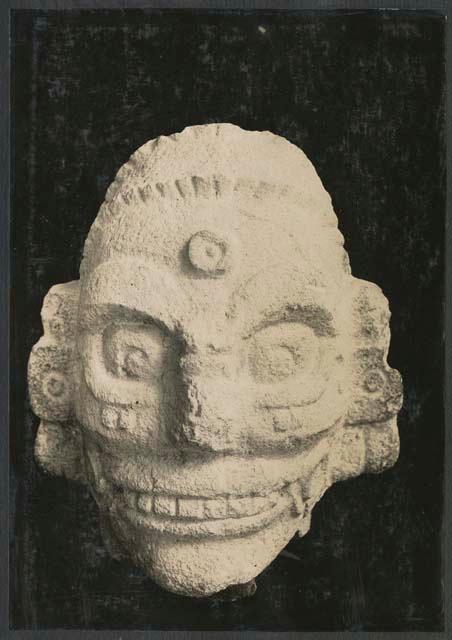 Carved stone head of Tlaloc