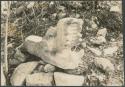 Carved stone feathered serpent head