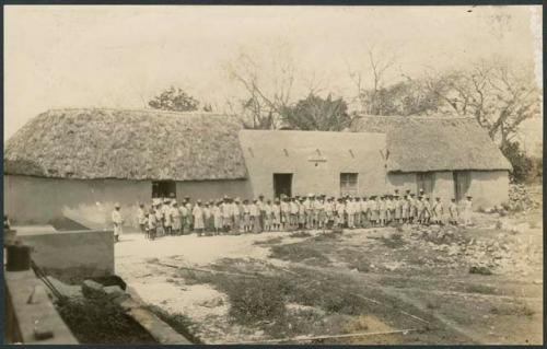 Group in front of office on pay-day