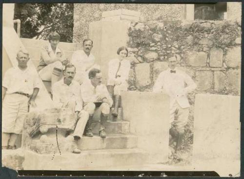 Staff members on stairway to pump house