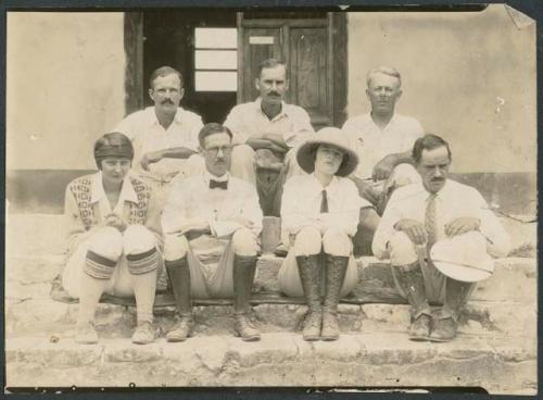 Staff members on west porch of hacienda