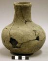 Ceramic complete vessel, mended, short neck, one body sherd missing