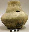 Ceramic vessel, complete, ring around base of neck, impressed design around base