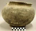 Ceramic vessel, complete, large, serrated lip around rim
