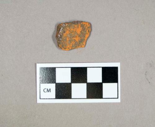 Ceramic, redware body sherd, undecorated exterior, dark brown glaze interior