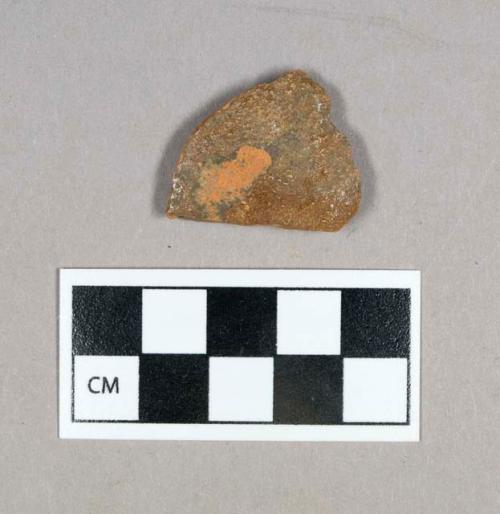 Ceramic, redware body sherd, glazed exterior, plain interior