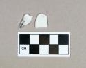 Glass, curved milk glass fragments