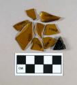 Glass, amber bottle body fragments