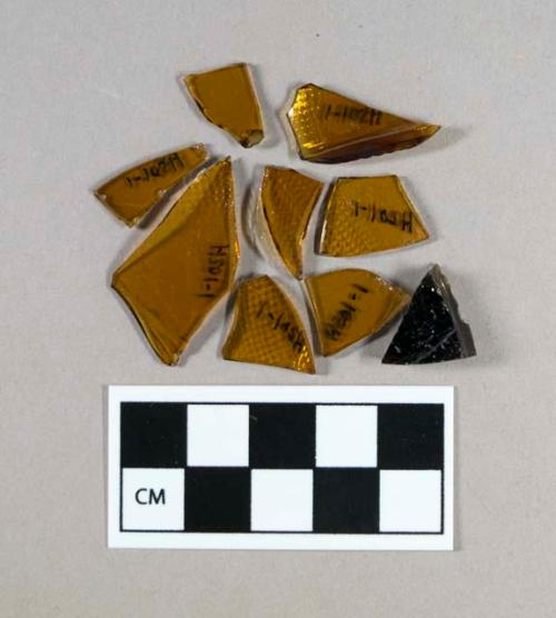 Glass, amber bottle body fragments