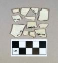 Ceramic, undecorated white salt glazed stoneware rim sherds