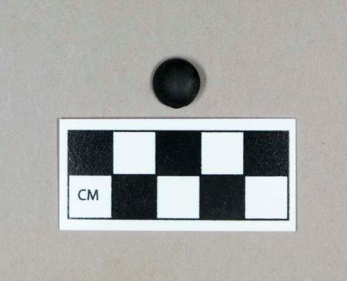 Glass, black shank button with metal loop remnants