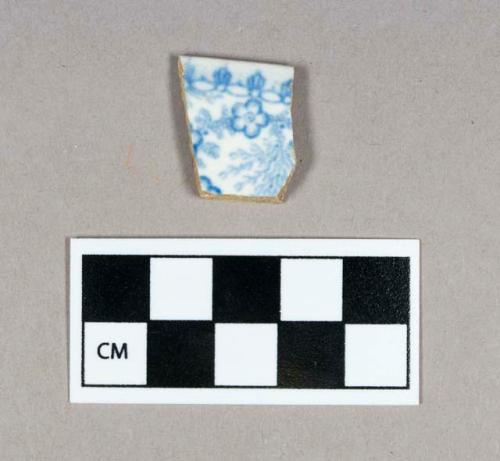 Ceramic, pearlware rim sherd, light blue transfer print interior