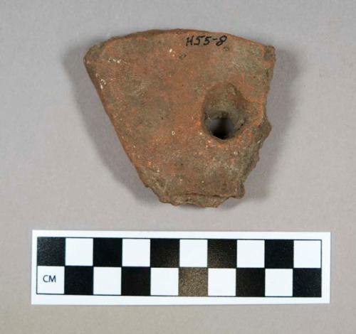 Ceramic/architectural, roof tile fragment with nail hole