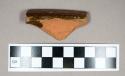 Ceramic, redware rim sherd, glazed interior