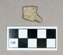 Ceramic, gray-bodied stoneware rim sherd, lip folded over itself