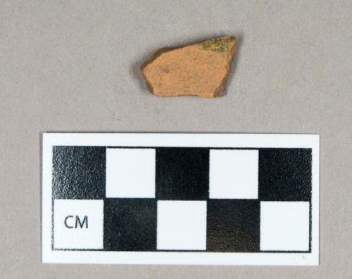 Ceramic, clear-glazed redware body sherd