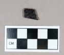 Ceramic, redware body sherd, dark brown glaze exterior, clear glaze interior