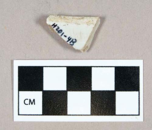 Ceramic, porcelain rim sherd, possible ghost marks on interior