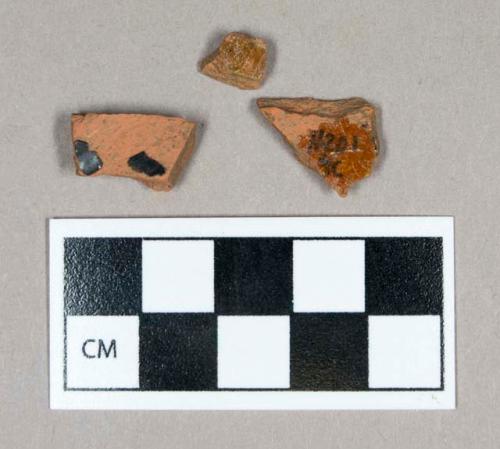 Ceramic, redware body sherds, black/dark brown glaze exterior, clear glaze interior