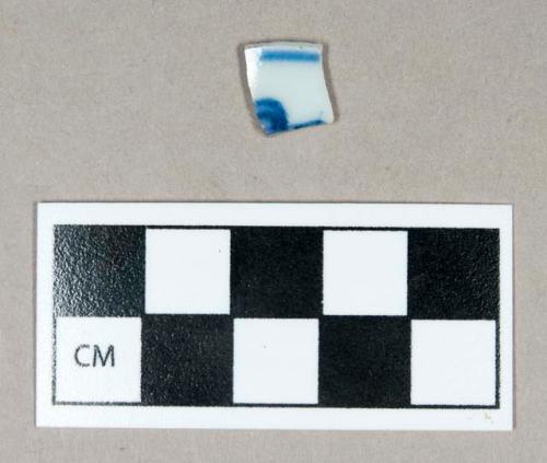 Ceramic, porcelain rim sherd, blue underglaze painted interior and exterior