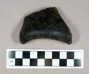 Glass, olive green bottle base/heel fragment