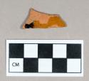 Ceramic, redware body sherd, clear glaze with brown slip exterior, interior surface missing