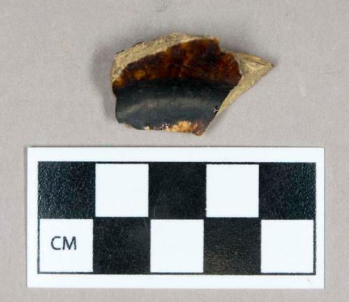 Ceramic, Rockingham ware on buff-bodied earthenware, base sherd