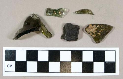 Glass, curved olive green body fragments