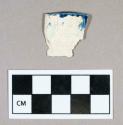 Ceramic, pearlware rim sherd, blue shell-edge design