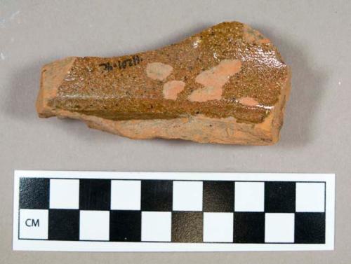 Ceramic, redware base sherd, clear glaze interior