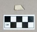 Ceramic, white salt glazed stoneware rim sherd, incised lines on both sides