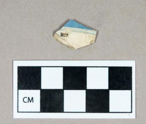 Ceramic, pearlware body sherd with blue decoration on exterior