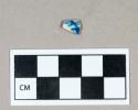 Ceramic, refined earthenware body sherd with blue transfer print exterior