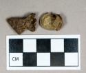 Metal, unidentified metal fragments attached to stone