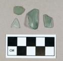 Glass, aqua-colored curved body fragments