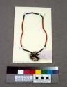 Child's bead necklet with two antelope horns