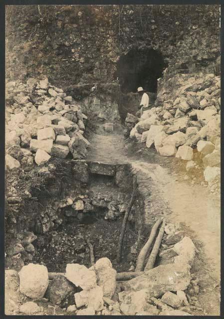 Temple of the Phalli, excavation with worker