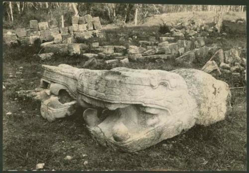 Castillo, serpent-heads in debris at base